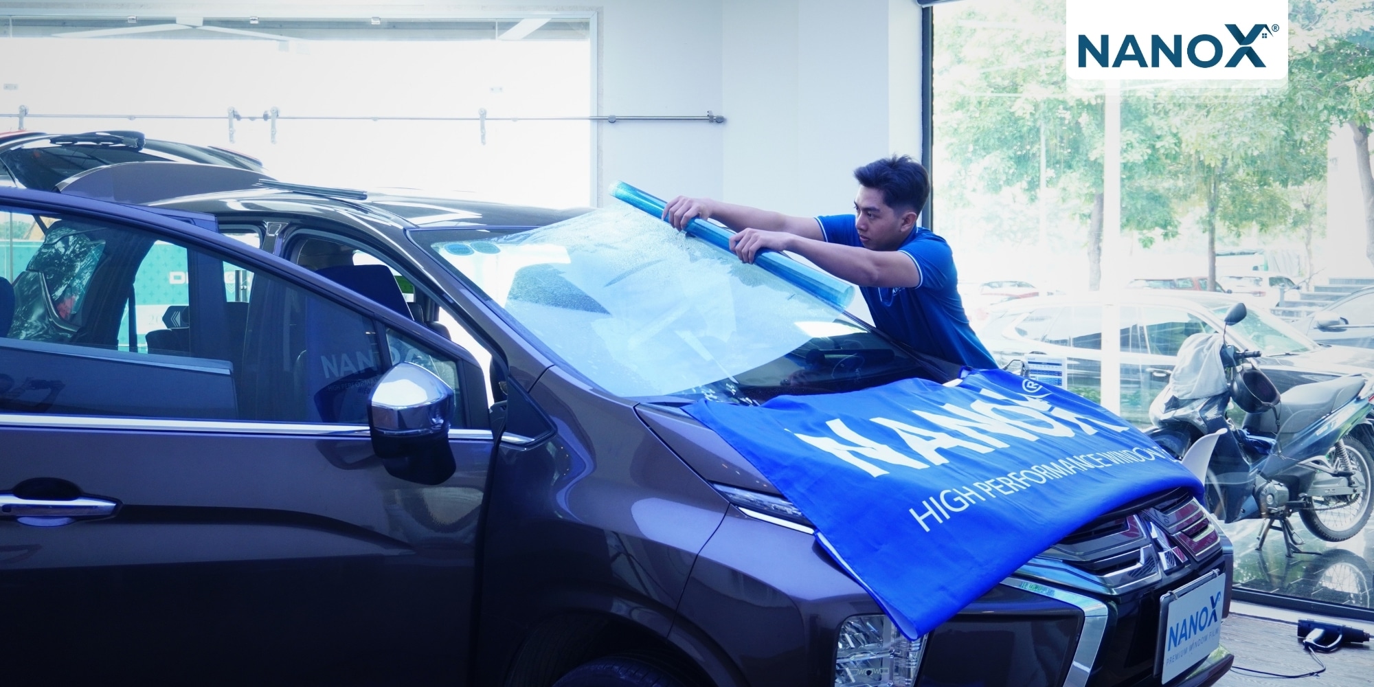 trai nghiem khach hang dan phim cach nhiet o to Mitsubishi Xpander 2